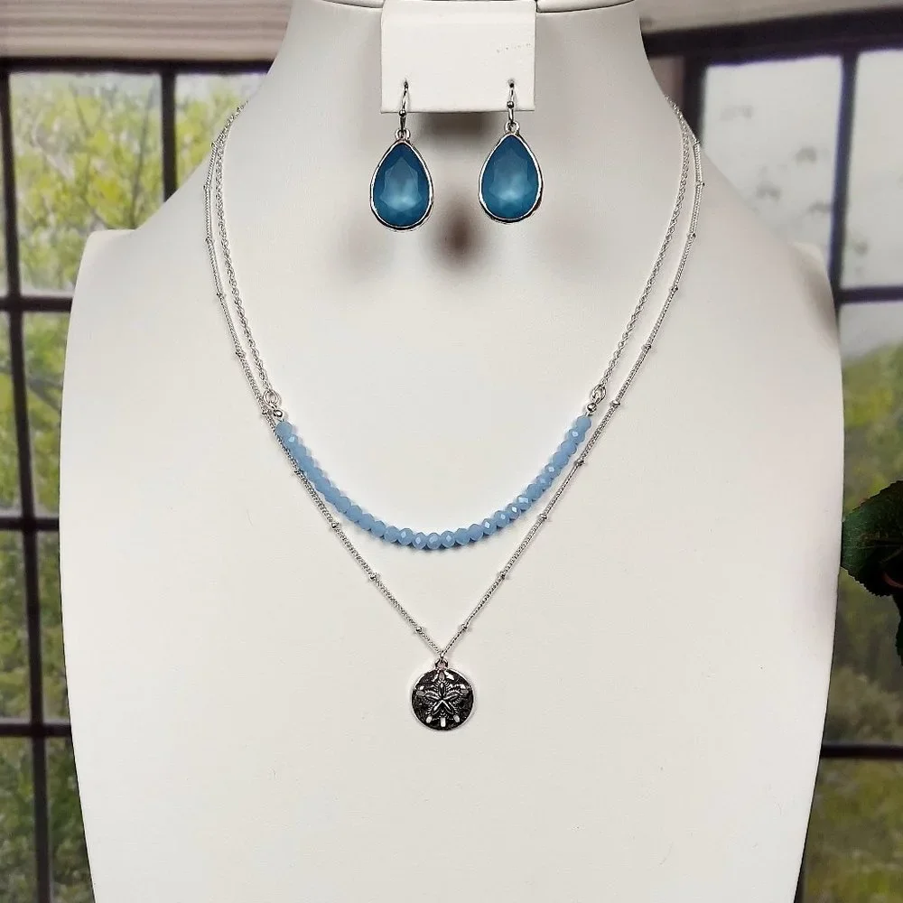 💖💖NIB AVON 2 TIER SILVER TONE SAND DOLLAR NECKLACE AND EARRING SET (BLUE)
